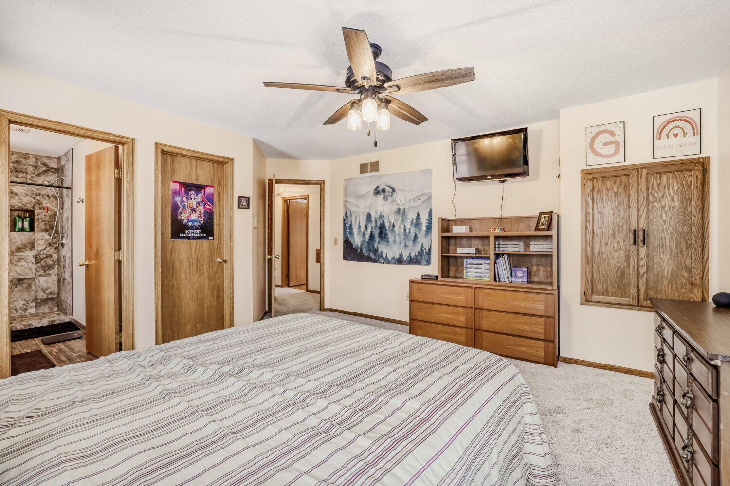 Another view of the Primary Bedroom with a private 3/4 bath