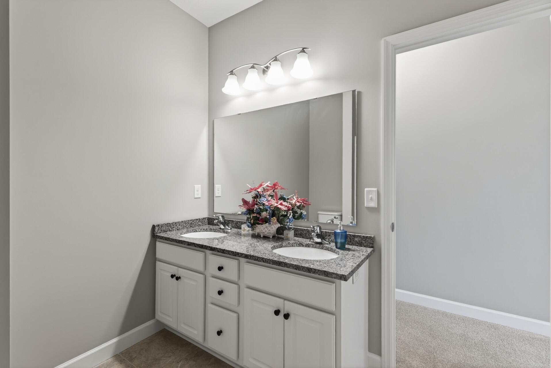 It's spacious layout and dual sinks ensure easy morning routines for all!