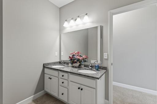It's spacious layout and dual sinks ensure easy morning routines for all!