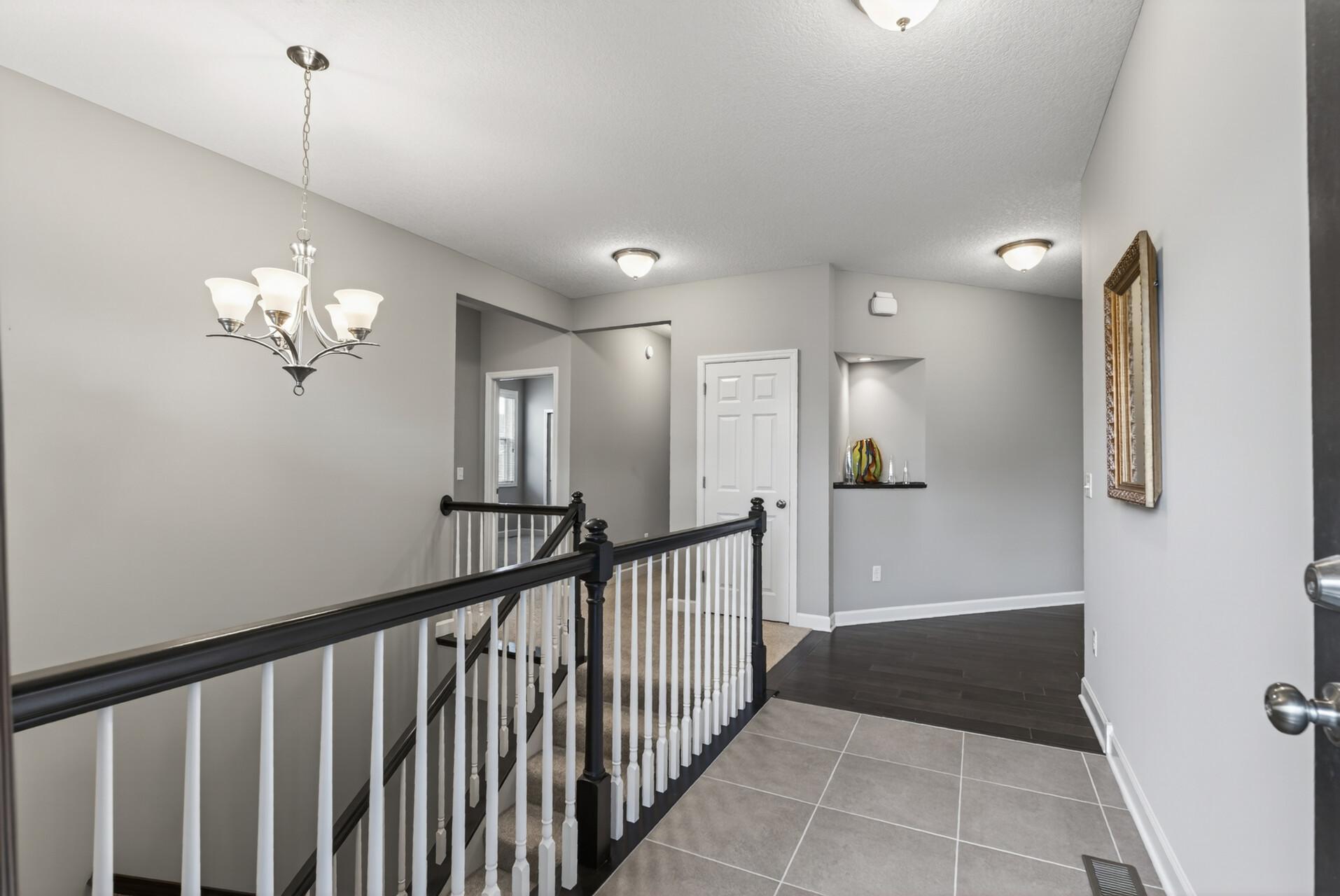 As you step inside, you’re welcomed by warm neutral tones throughout the home.