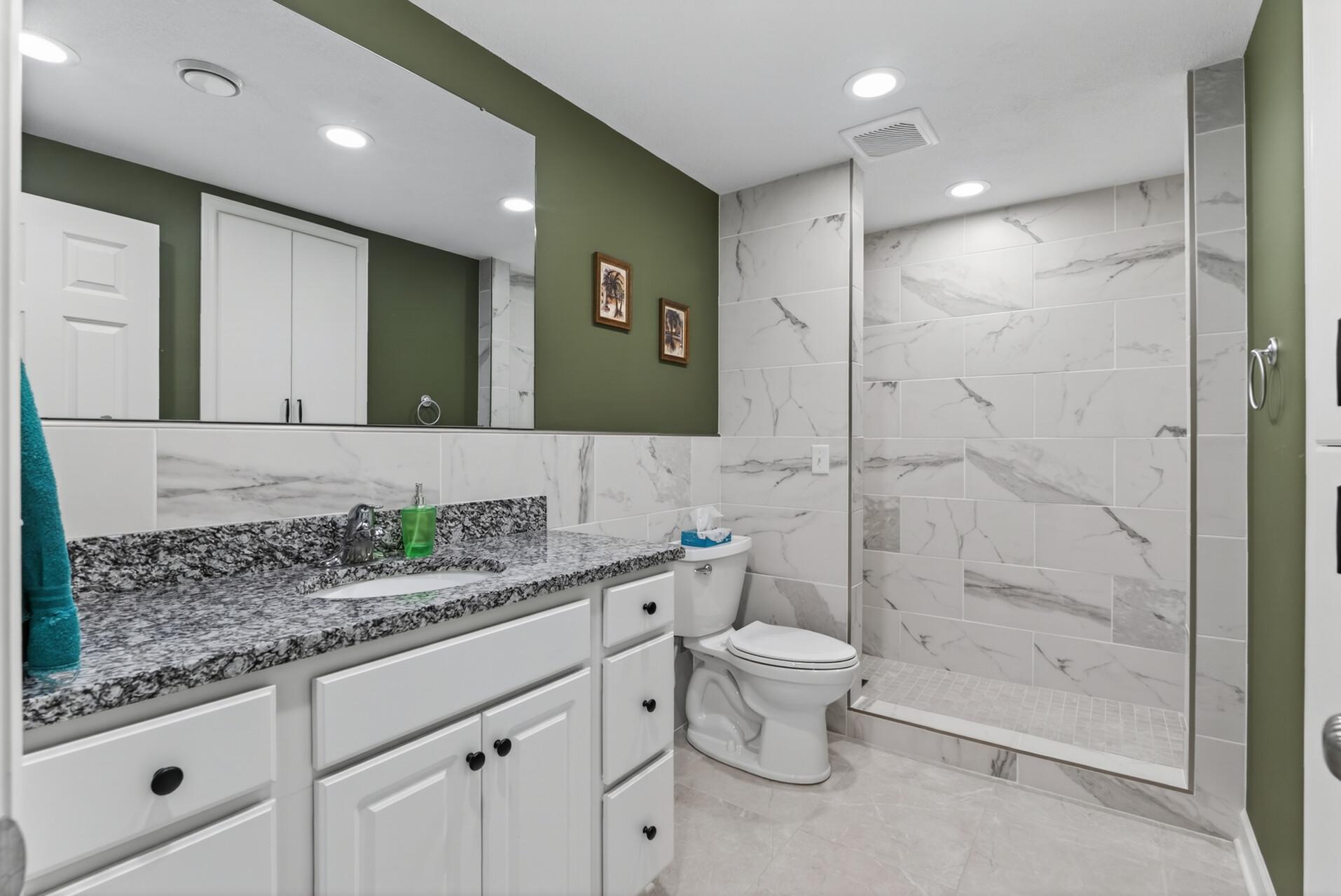 Lower level bathroom. You'll love the tile work!