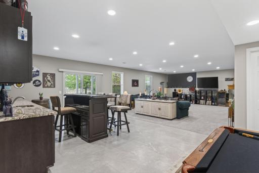Recessed lighting keeps the lower level feeling bright and inviting!
