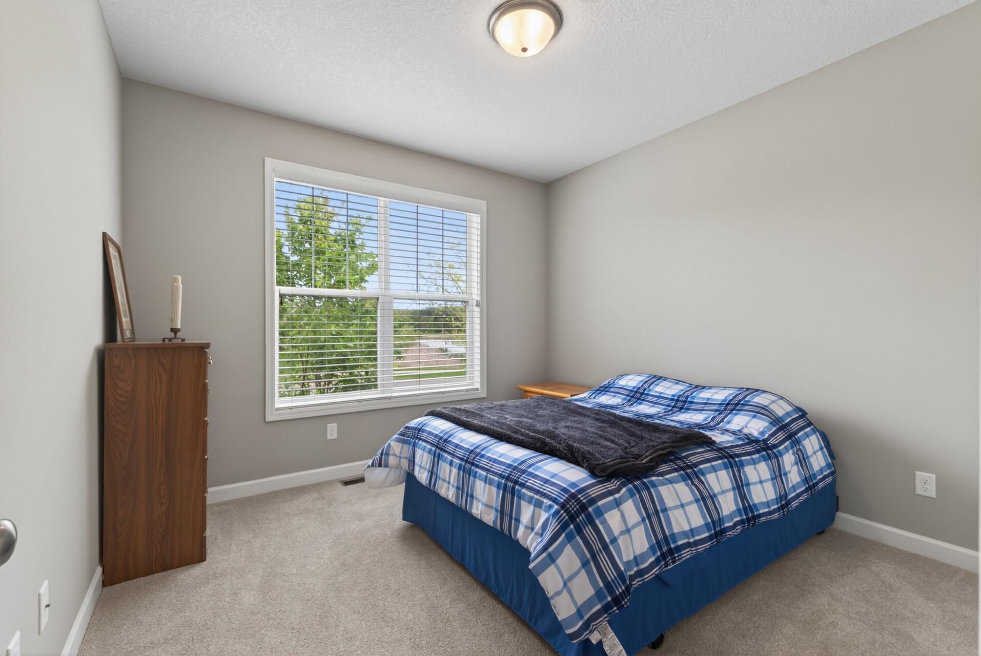Third main level bedroom. You'll love the convenience of three bedrooms on the same level!