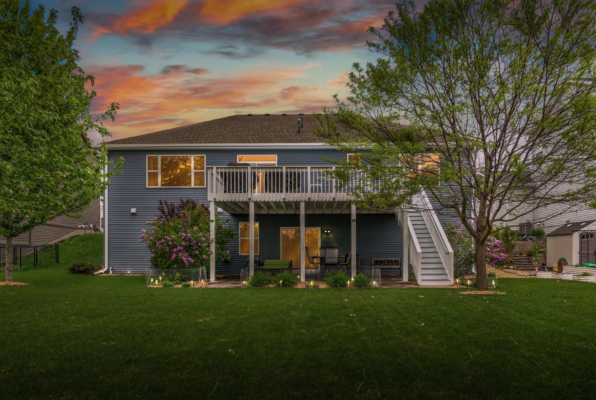 Enjoy outdoor living on the spacious deck and patio, surrounded by plenty of green space for yard games, entertaining, or simply relaxing.