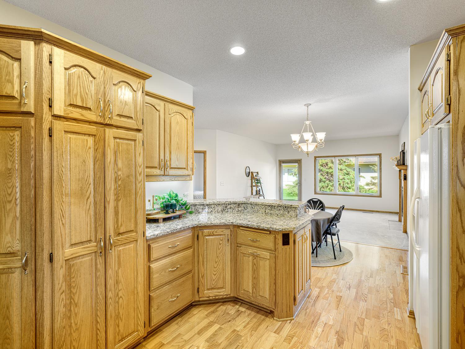 Convenient pull-out pantry drawers provide easy access and effortless organization.