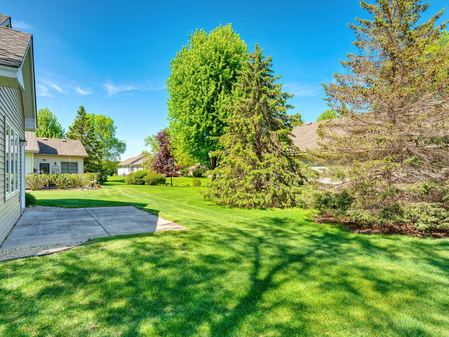 Private patio with plenty of green space for your enjoyment!
