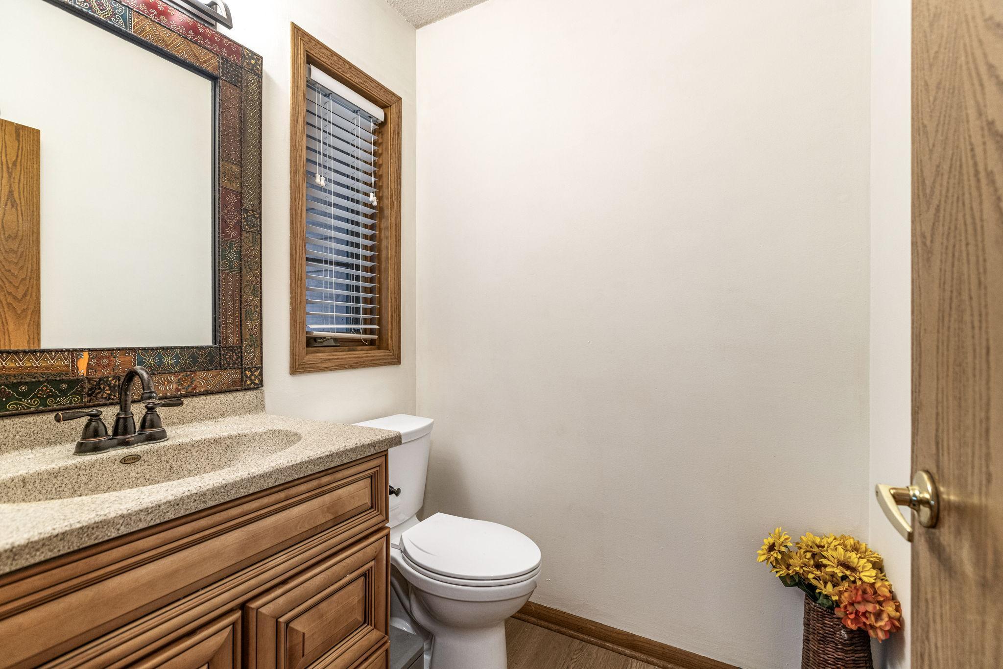Main floor half bath next to the front door