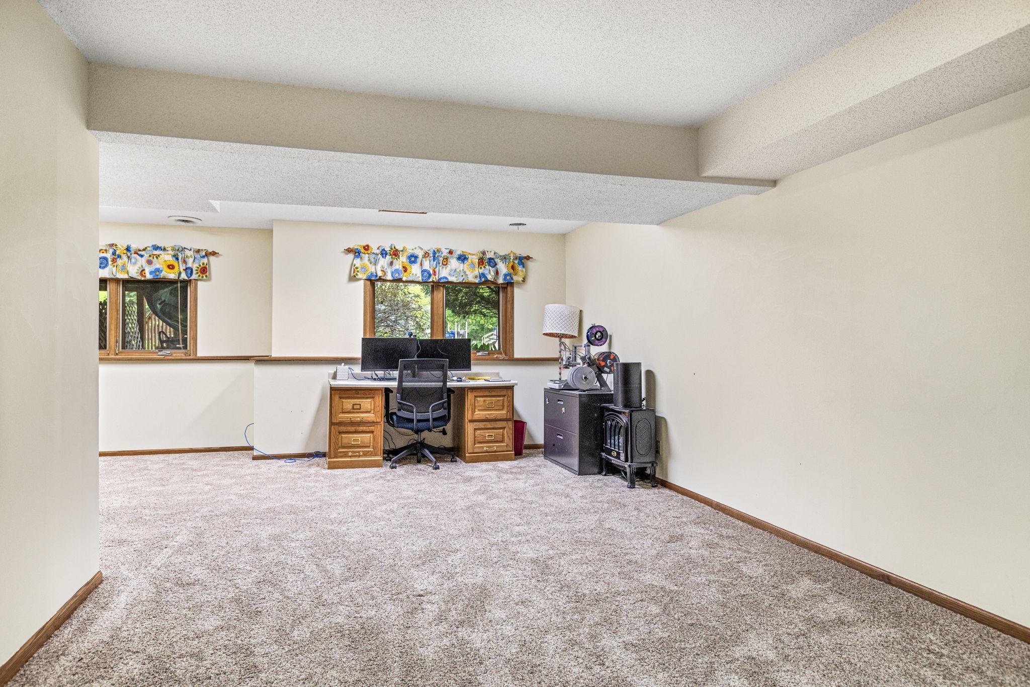 L shaped basement amusement room