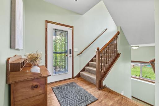 This home has an amazing amount of windows with blinds on them all! There is so much natural light AND you can enjoy the beautiful outdoors everywhere you look.