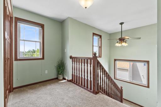 Upper level landing with a large closet. The loft is west facing.