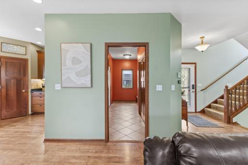 Large mudroom with built ins, a closet and direct access to the 3 stall garage.