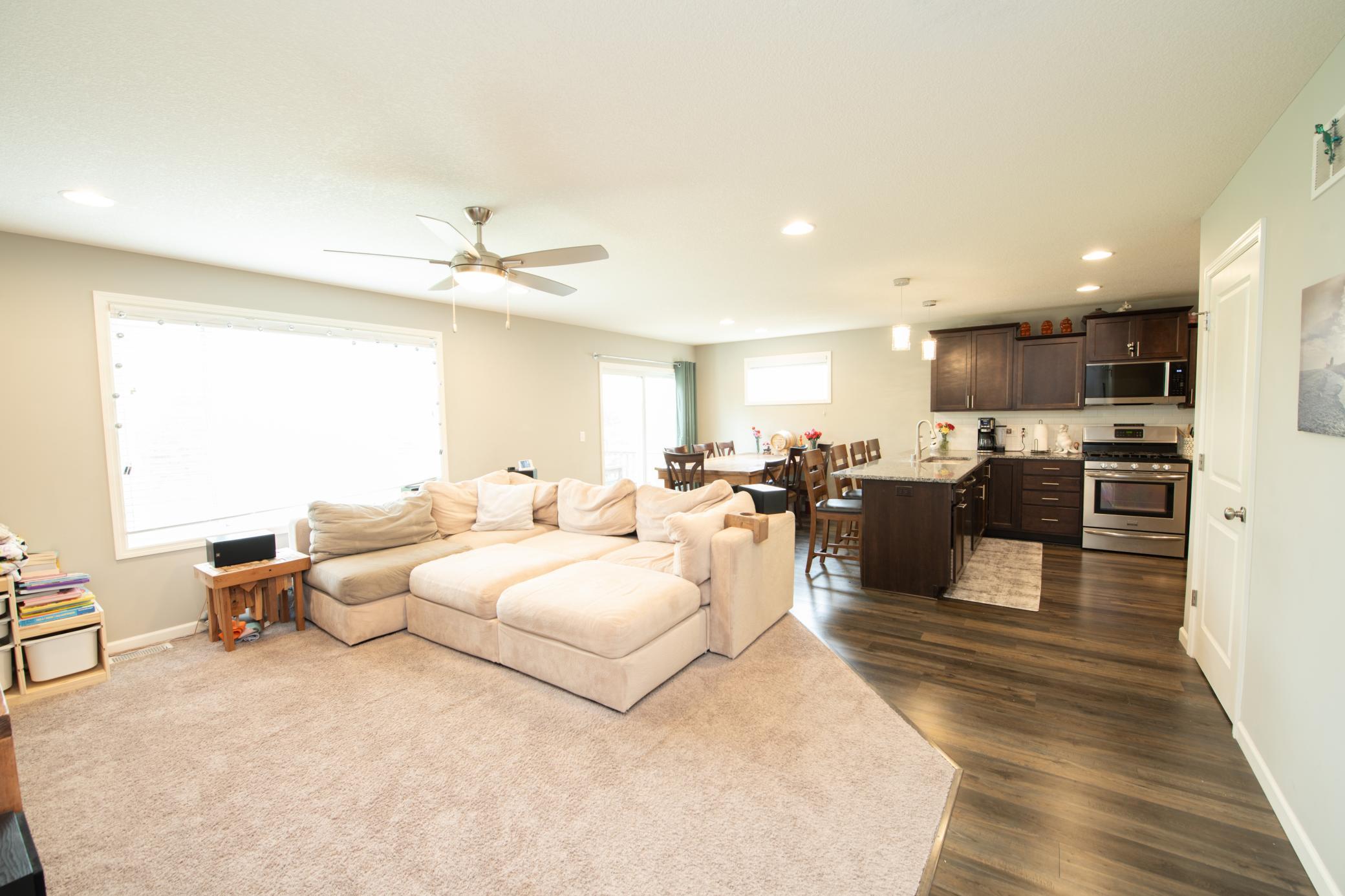 Walk into main level living room dining area and kitchen.jpg