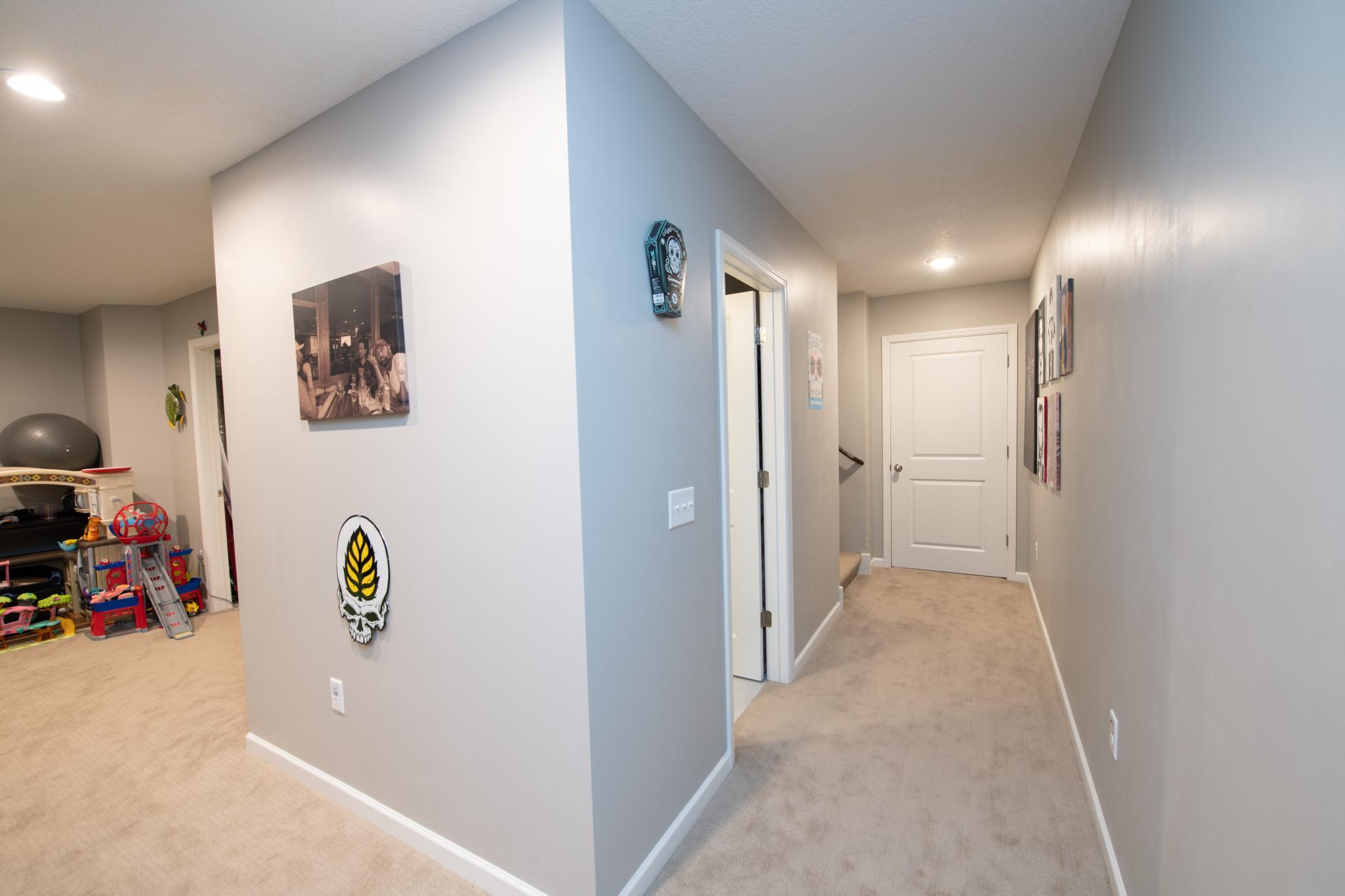 Entrance down to basement bath to left stroage closet.jpg