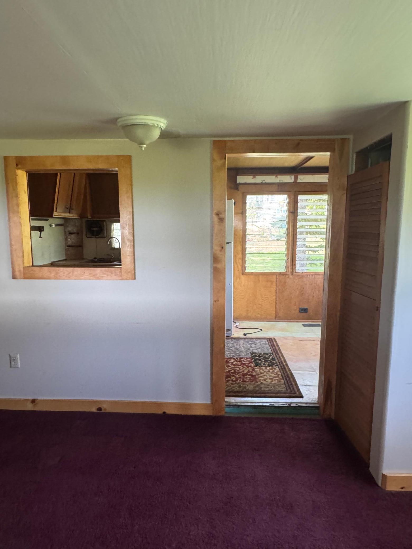 Dining/bonus area to kitchen