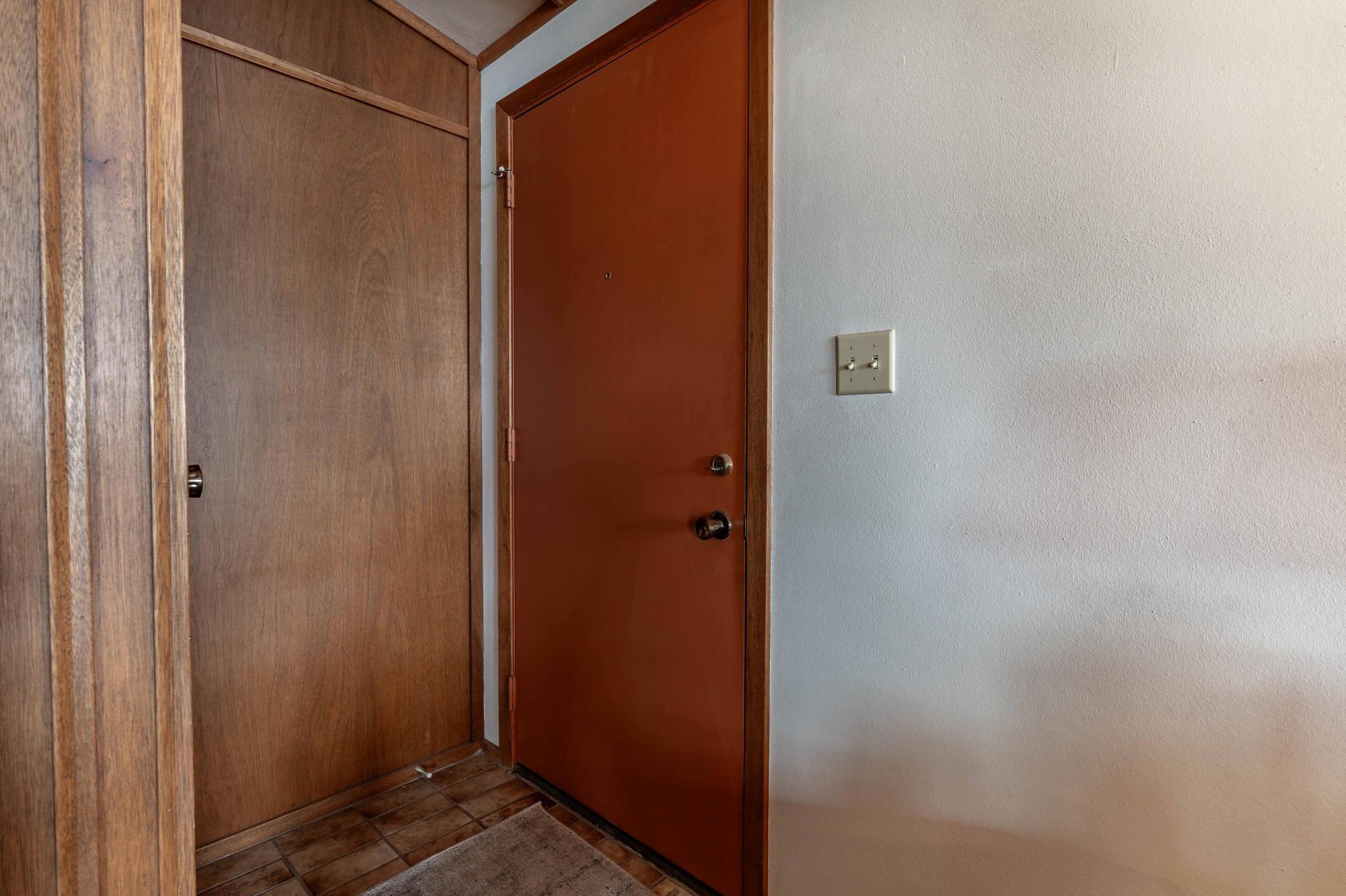 Side entrance door to living room