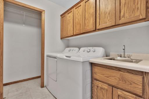 Main floor laundry off the attached garage.