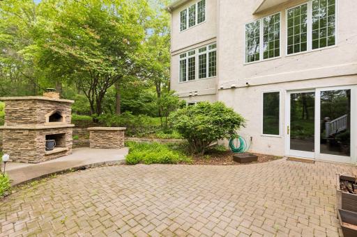 The huge paver patio and custom Brick Masonry oven only enhance your outdoor enjoyment