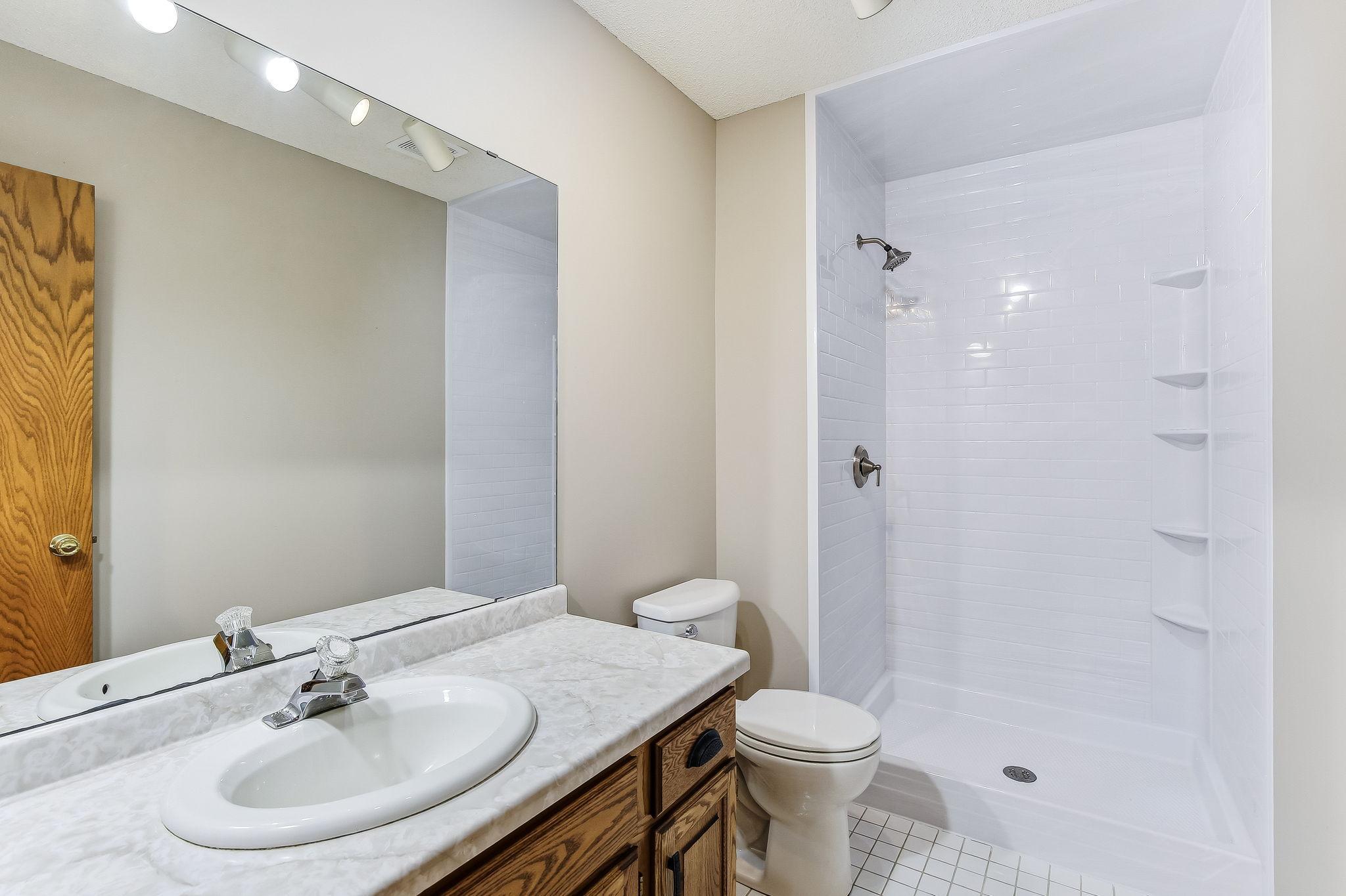 Lower level bath with updated shower!