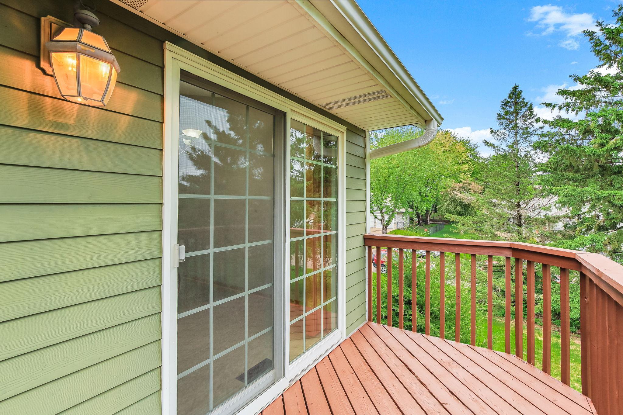 Balcony off the dining room with steps to the lower level deck!