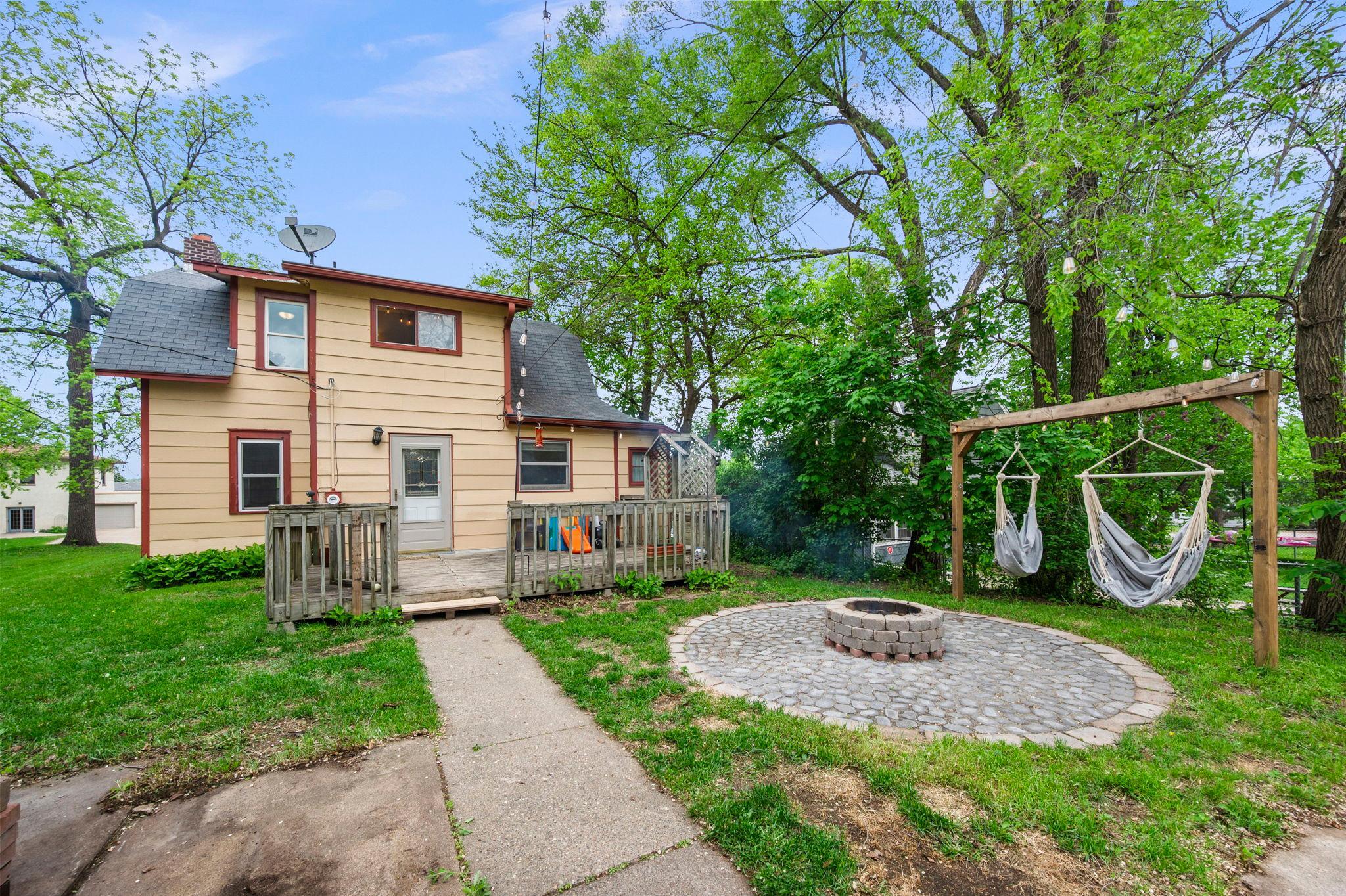Paver patio right off the deck is the perfect place for a campfire!