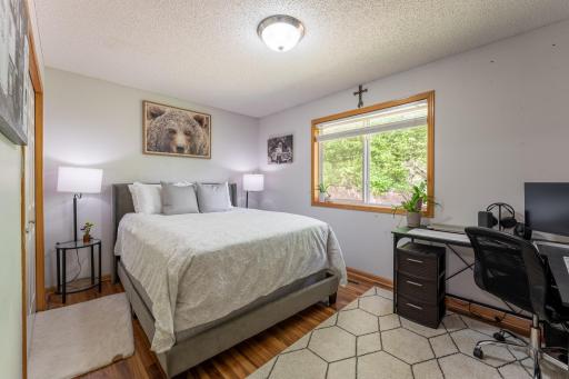9.5x13.75 second bedroom with a beautiful view of the backyard.