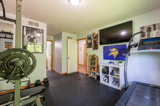 12.75x11.75 primary bedroom with a walk in closet and ensuite bathroom.