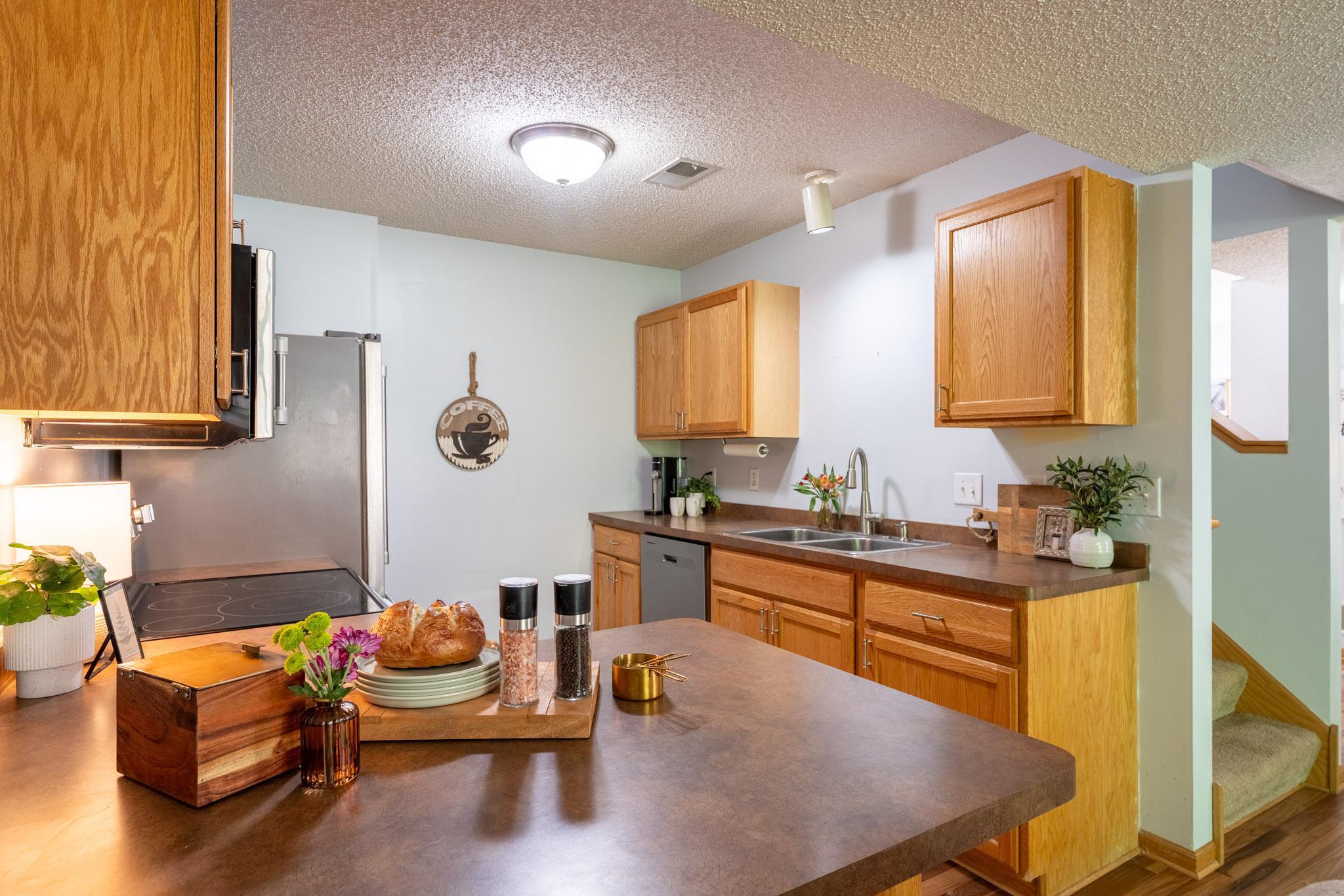 Nice counter space with a breakfast bar area.