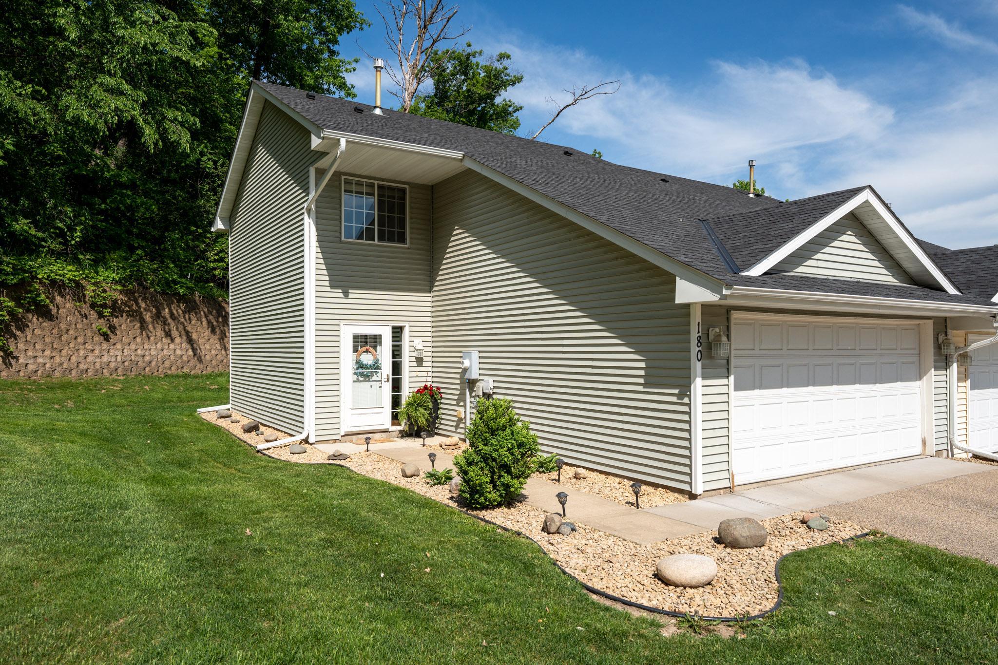 Welcome home to this inviting end-unit townhome with a private backyard setting, offering the extra privacy and quiet that’s hard to come by.