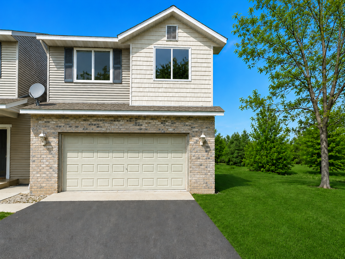 Adorable end unit townhome with no association! Extra green space on the side and newly seal coated driveway (2026).