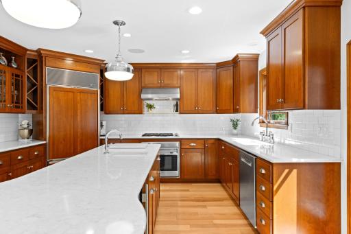 Ample counter and cabinet space, with thoughtful built ins