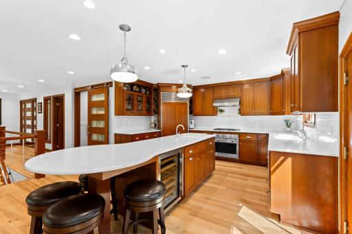 A chef's kitchen, with high end SS appliances and custom cherry cabinetry
