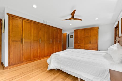 Custom built in armoires with internal lighting