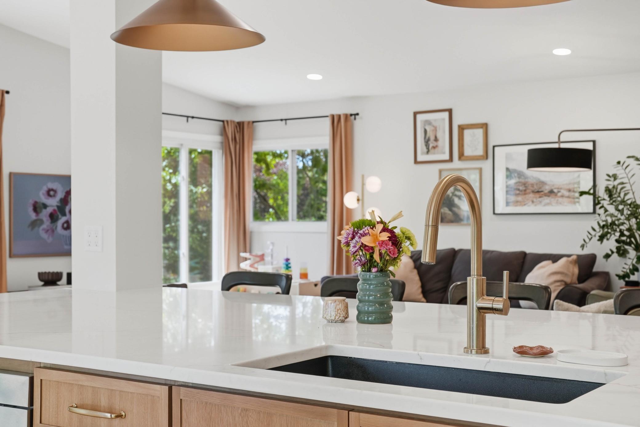 Brushed gold fixtures create a warm aesthetic