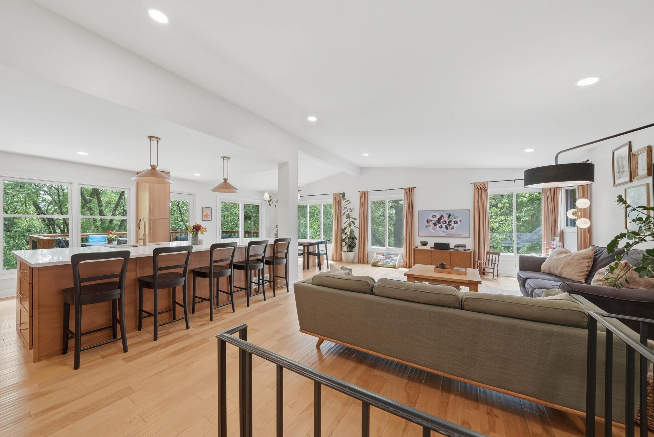 Step up stairs to open concept living room.