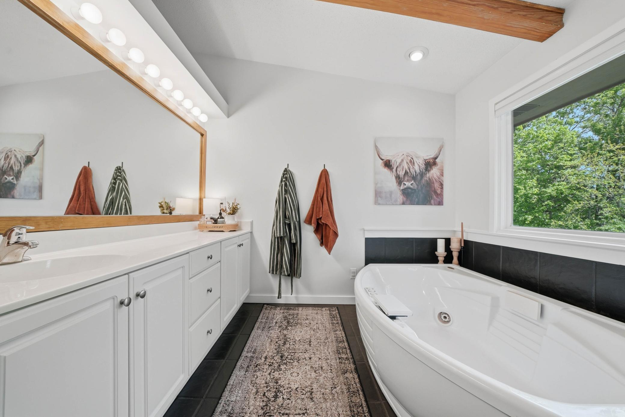 Large vanity with soaking tub