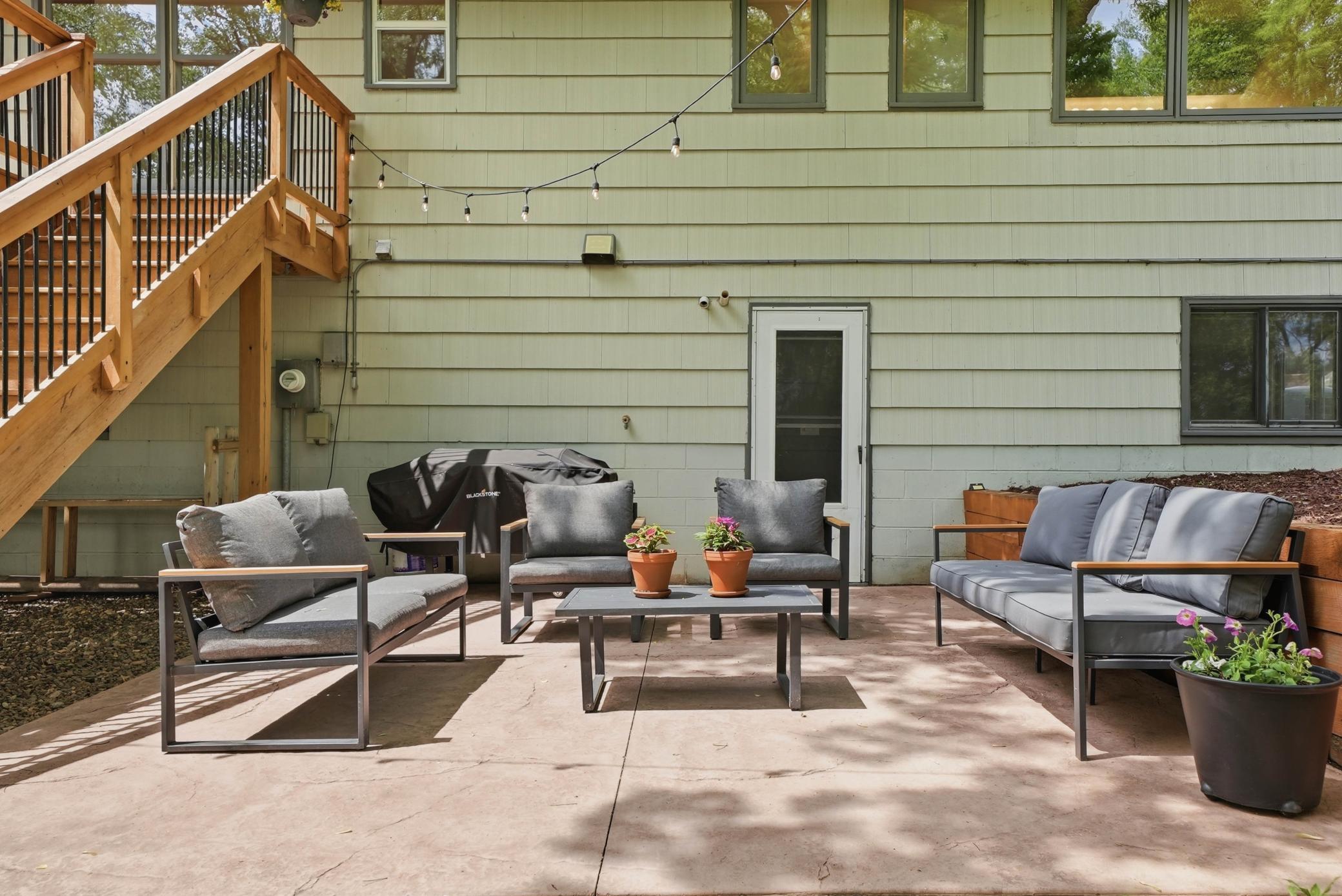 Enjoy summer evenings under the lights of this newly built stamped concrete patio