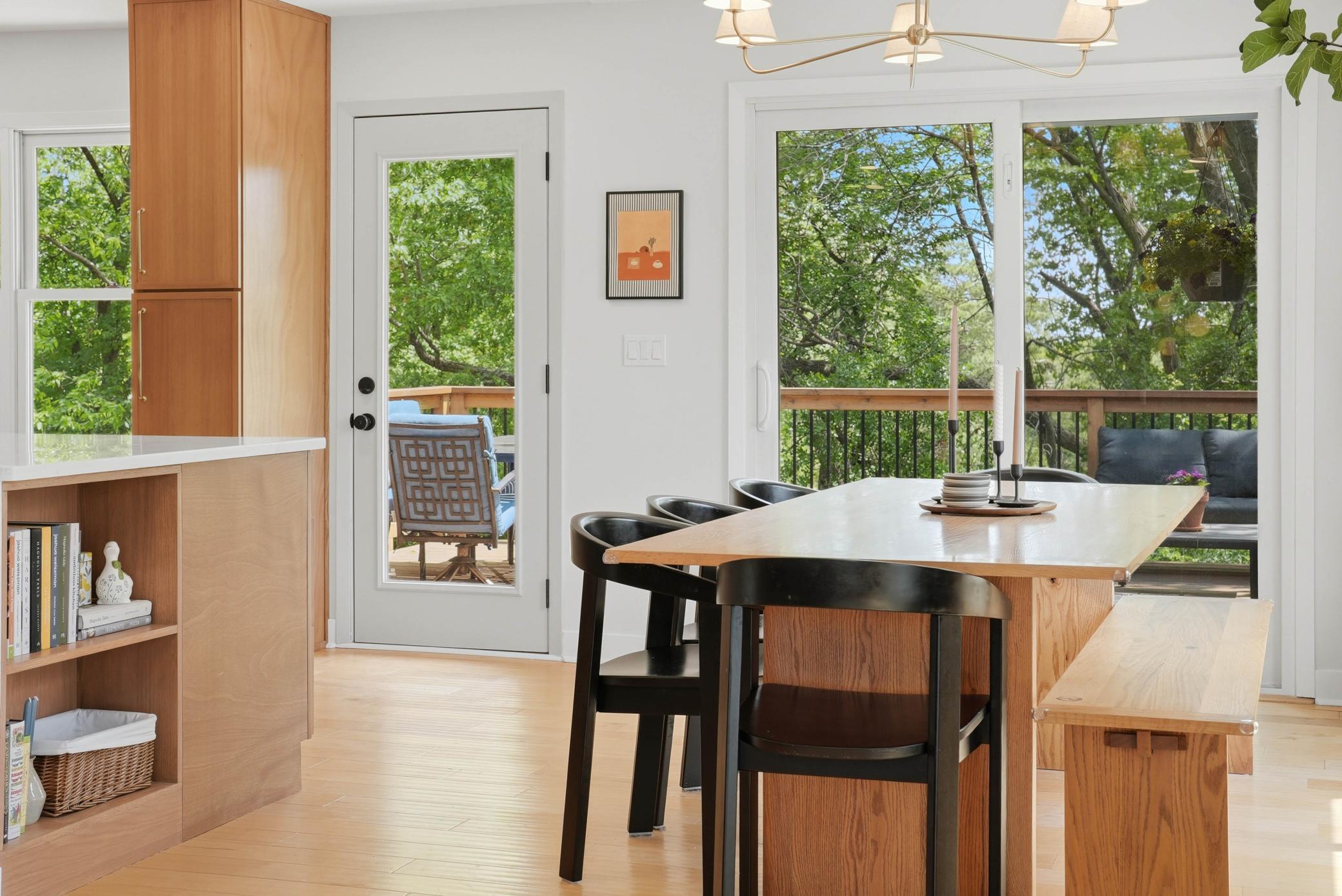 Informal dining area overlooks newly built deck