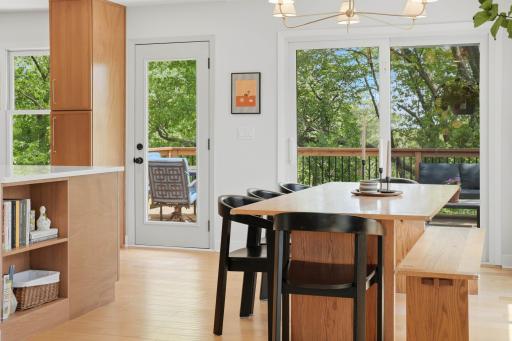 Informal dining area overlooks newly built deck