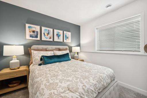 (Photo of decorated model, actual home's finishes will vary) A fourth bedroom is included at both the standard finished basement and the optional finished basement.