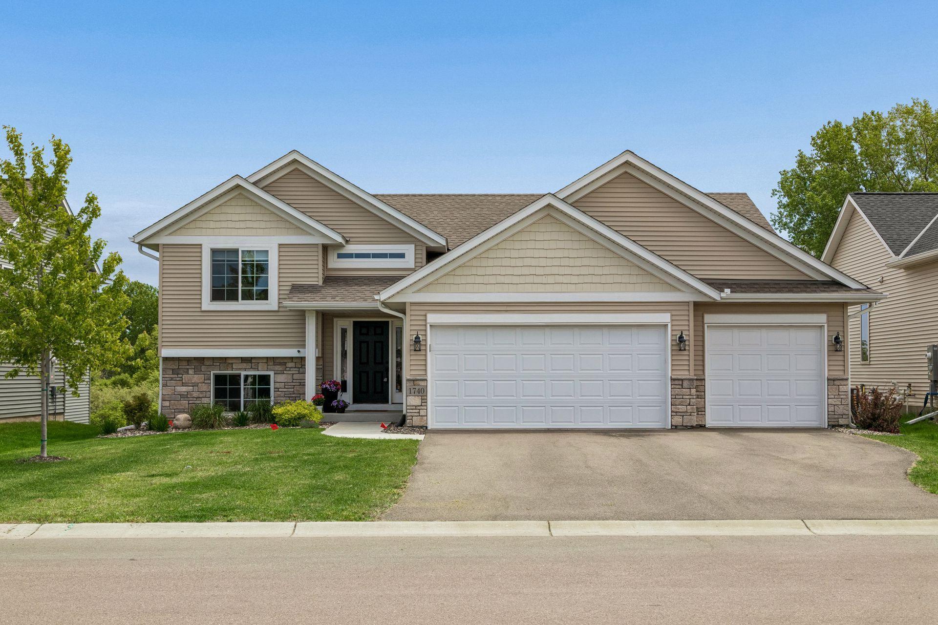 A three car garage is awesome to have for storage as well as car space!
