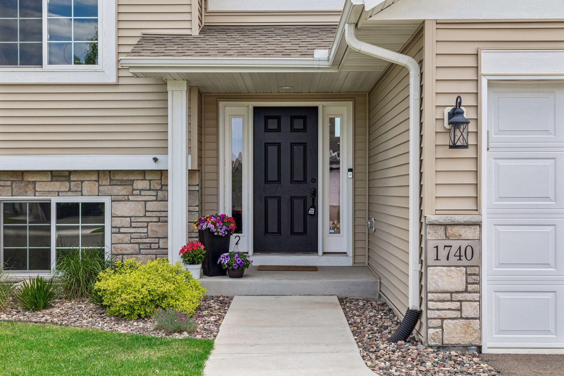 Beautiful curb appeal at this 2023 build in Farmington!