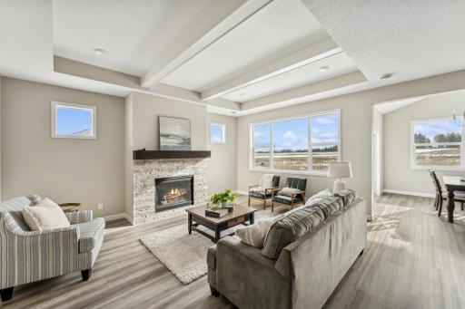 Living room - photos are of a staged home of similar floorplan, selections/colors may differ