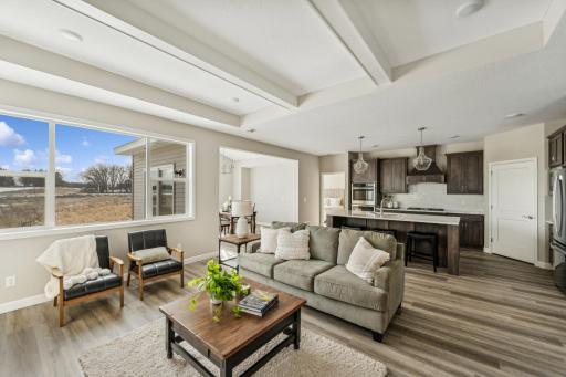 Living room - photos are of a staged home of similar floorplan, selections/colors may differ