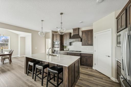 Kitchen - photos are of a staged home of similar floorplan, selections/colors may differ