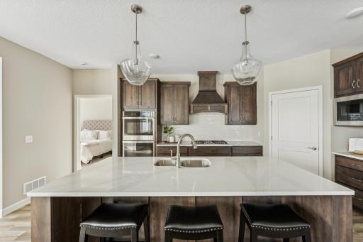 Kitchen - photos are of a staged home of similar floorplan, selections/colors may differ