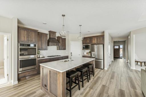 Kitchen - photos are of a staged home of similar floorplan, selections/colors may differ