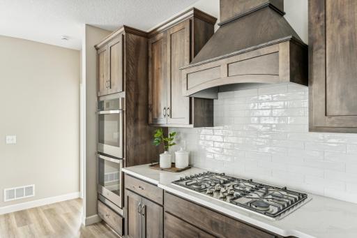 Kitchen - photos are of a staged home of similar floorplan, selections/colors may differ
