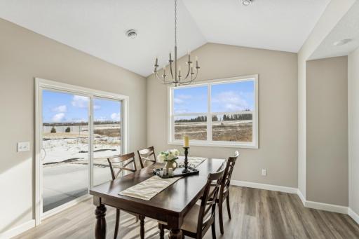 Dining room - photos are of a staged home of similar floorplan, selections/colors may differ