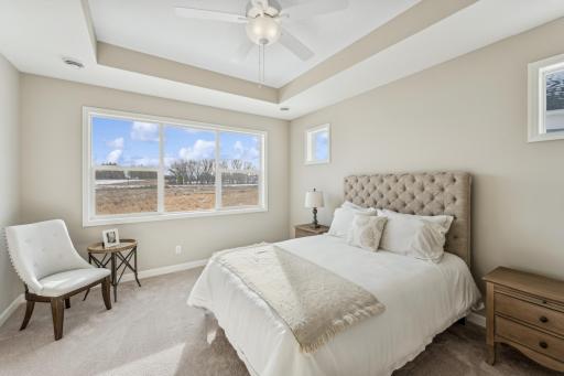 Primary suite - photos are of a staged home of similar floorplan, selections/colors may differ