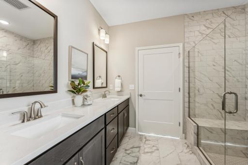 Primary suite bathroom - photos are of a staged home of similar floorplan, selections/colors may differ